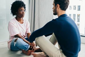 Woman and man in discussion